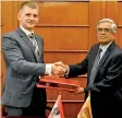  ??  ?? Finance and Mass Media Ministry Secretary Dr. R. H. S. Samaratung­e exchanging agreement with Deputy Commercial Counsellor of the Austrian Embassy, Siegfried Weidlich