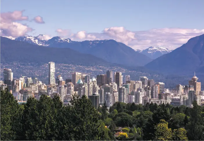  ?? George Rose / Getty Images 2013 ?? Vancouver, British Columbia, is a seaport city struggling with wages that don’t match its very expensive housing.