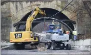  ??  ?? Constructi­on that began in November continues on the Neversink Road railroad underpass in Exeter Township.