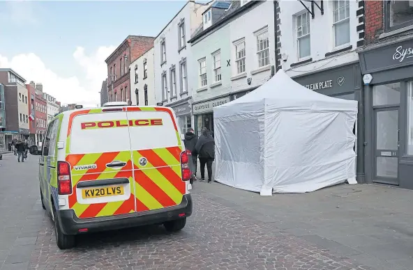  ??  ?? SEALED OFF: Police have started to search a cafe in Gloucester after a tip-off that a 15-year-old potential victim of Fred West could be buried there.