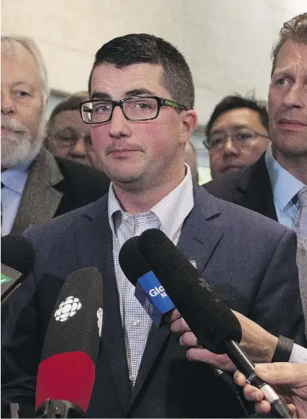  ?? GREG SOUTHAM ?? United Conservati­ve Party interim leader Nathan Cooper speaks to reporters after the first meeting of the new party’s caucus Monday in Edmonton. Cooper has been the Wildrose house leader for the last two years.