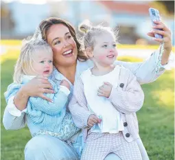  ?? ?? Amie Rohan snaps a selfie with daughters Sadie, 2, and Bella, 4. Picture: David Caird