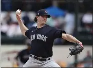  ?? CARLOS OSORIO - THE ASSOCIATED PRESS ?? In this March 5 file photo, New York Yankees starting pitcher Gerrit Cole throws during a spring training baseball game against the Detroit Tigers in Lakeland, Fla.