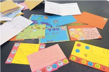  ?? JIM THOMPSON/ JOURNAL ?? Eisenhower Middle School students made upward of 700 cards to send to schools in El Paso following a mass shooting this year.