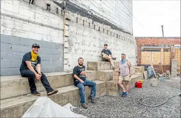  ?? Alexandra Wimley/Post-Gazette ?? Trace Brewing co-founders Dave Kuschner, left, Brandon McCarthy, Zach Colton and Katie Rado on July 16 in Bloomfield.