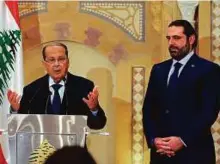  ??  ?? Former Lebanese prime minister Sa’ad Hariri (right) with Christian politician and FPM founder Michel Aoun after announcing his backing for Aoun in the presidenti­al poll.