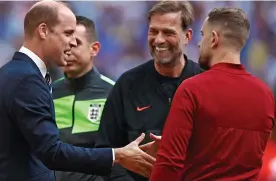  ?? ?? TARGET: William greets Liverpool’s Jurgen Klopp and Jordan Henderson