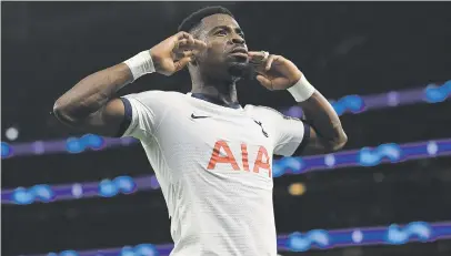  ?? Picture: Getty Images ?? COOL CAT. Spurs’ Serge Aurier celebrates after scoring his team’s third goal during their Uefa Champions League match against Olympiacos at Tottenham Hotspur Stadium on Tuesday night.