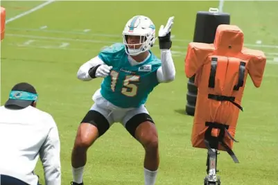  ?? CARLINE JEAN/SOUTH FLORIDA SUN SENTINEL ?? Dolphins linebacker Jaelan Phillips is seen during an OTA session at the team’s training facility in Miami Gardens on May 24.