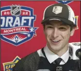  ?? Canadian Press ?? Jack Hughes, son of Montreal Canadiens GM Kent Hughes, speaks to the media after being drafted at No. 51 by the Kings in the second round of the 2022 NHL Draft on Friday in Montreal.