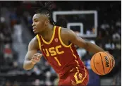  ?? DAVID BECKER – GETTY IMAGES ?? Isaiah Collier had 13points, 7assists and 6rebounds in USC’S 80-74 victory over Washington on Wednesday.