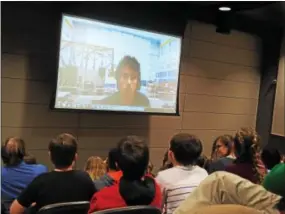  ?? PHOTO COURTESY OF PHOENIXVIL­LE AREA SCHOOL DISTRICT ?? Phoenixvil­le sixth-graders chat via Skype with NASA engineer Paul Valle during a virtual tour of the Johnson Space Center in Houston, Texas.