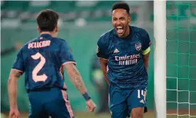  ?? Photograph: Chris Hofer/Getty Images ?? Pierre-Emerick Aubameyang celebrates with Héctor Bellerín after the pair combined for the former to score Arsenal’s winner.