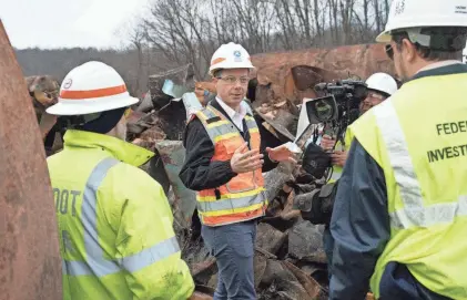  ?? BROOKE LAVALLEY/COLUMBUS DISPATCH ?? Transporta­tion Secretary Pete Buttigieg tours the site of the Feb. 3 train derailment Thursday in East Palestine, Ohio. Buttigieg has faced criticism for not visiting the site earlier.