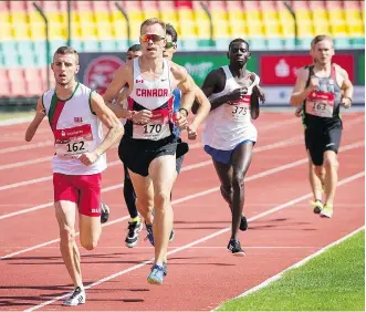  ?? RALF KUCKUCK/THE CANADIAN PRESS ?? Nathan Riech of Canada, second, who suffered a severe brain injury after being hit by a golf ball at the age of 10, has turned heads on the Paralympic track, setting two world records at the world Paralympic Athletes Grand Prix last week in Berlin.