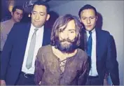  ?? Associated Press ?? CHARLES MANSON is escorted to a Los Angeles courtroom for his arraignmen­t in 1969.