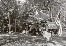  ??  ?? The Squires family enjoys the campsite on Saturday. “I am happy the parks are open,” Martha Squires said. “There’s nothing better during COVID than fresh air and being outdoors.”