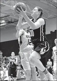  ?? Photo courtesy of Jeff Montgomery ?? Harding sophomore forward Caroline Hogue, who had 24 points and 12 rebounds Wednesday, heads to the basket in the first half of Wednesday’s game against Ashland (Ohio). The Lady Bisons’ loss ended their 17-game winning streak as well as their season.