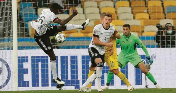  ?? (EPA) ?? Pertahanan Jerman, Antonio Rudiger beraksi pada saingan Liga Negara-negara UEFA menentang Ukraine, semalam. Jerman menang 2-1.