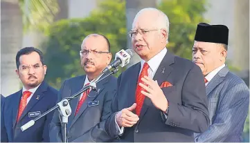  ??  ?? Najib delivers his speech at the monthly meeting of the Prime Minister’s Department. — Bernama photo