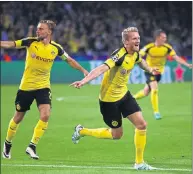  ??  ?? SUCKER PUNCH: Dortmund substitute Andre Schurrle celebrates late equaliser.