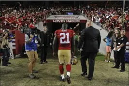  ?? JOSE CARLOS FAJARDO — BAY AREA NEWS GROUP, FILE ?? Frank Gore (21) walks off the field after the 49ers lost to the Bears during their September 2014 game at Levi's Stadium in Santa Clara. Gore on Thursday retired after signing a one-day contract with the 49ers.