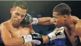  ?? /C H R I ST I A N PETERSEN/ GETTY IMAGES ?? Devin Haney, right, lands a right punch onto Rafael Vazquez’s head.