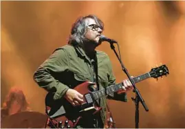  ?? TERRENCE ANTONIO JAMES/CHICAGO TRIBUNE ?? Jeff Tweedy and his band Wilco perform at Jay Pritzker Pavilion in Chicago in August 2021.