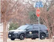  ?? ?? Police secure the area around a synagogue Saturday in Colleyvill­e, Texas.