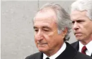  ?? AP PHOTO/DAVID KARP ?? Former financier Bernie Madoff leaves federal court in Manhattan in New York in 2009.