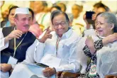  ?? — PTI ?? Senior Congress leader Ghulam Nabi Azad shares a lighter moment with former Finance Minister P Chidambara­m and veteran Congress MP Ambika Soni in New Delhi on Sunday.