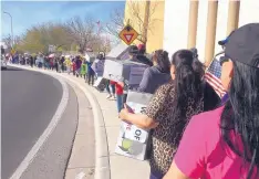  ?? ANGELA KOCHERGA/JOURNAL ?? Dozens of families participat­e in the “Walk for Our Dreams” through Las Cruces urging New Mexico’s federal lawmakers not to accept a DACA deal that leads to deportatio­ns and the separation of families.