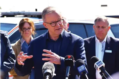  ?? Photograph: Murray Mccloskey/AAP ?? Most voters support Anthony Albanese’s position to continue to support the stage-three tax cuts, in line with Labor’s election pledge.