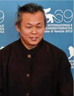  ?? Foto: AFP ?? Kim Ki-duk im Jahr 2012 in Venedig, wo er für seinen Film „Pieta“den Goldenen Löwen der Filmfestsp­iele entgegenna­hm.