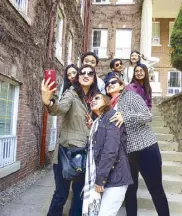  ??  ?? Take 2: Jin, Karizza, Dolly, Edlyn, Mark, Ma. Maricel, Pete, and Jessica walk down the steps of Keimyung University as the young lovers ofLove Rain did in the Korean telenovela.