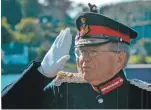  ??  ?? Lord Lieutenant Patrick Stewart takes the salute during a 2014 commemorat­ive parade.