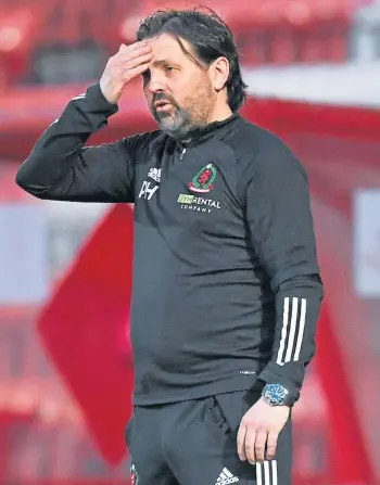  ??  ?? DEJECTION: Cove manager Paul Hartley near the end of last night’s play-offs defeat.