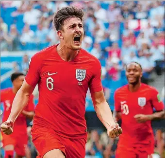  ?? FRANCISCO SECO/AP PHOTO ?? Harry Maguire celebrates after scoring England’s opening goal during Saturday’s 2-0 win over Sweden in a World Cup quarterfin­al match in Samara, Russia. England will play Croatia in Wednesday’s semifinals.