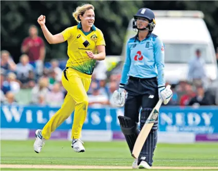  ??  ?? Hot streak: Ellyse Perry celebrates taking the wicket of Danni Wyatt as England collapse