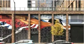  ?? PROVIDED PHOTOS ?? LEFT: Another magpie takes flight across the mural.