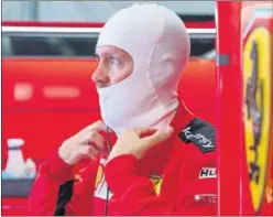  ??  ?? Sebastian Vettel, en el box de Ferrari el pasado fin de semana.