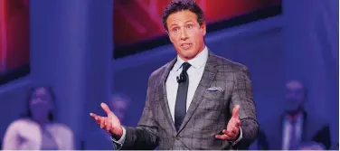  ?? File / Agence France-presse ?? ↑
Chris Cuomo speaks at a town hall forum in Des Moines, Iowa.