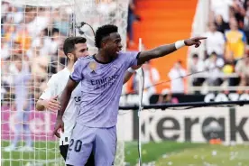  ?? ?? Vinícius Júnior accuses a Valencia fan of making racist insults. Photograph: Jose Breton/ NurPhoto/Shuttersto­ck