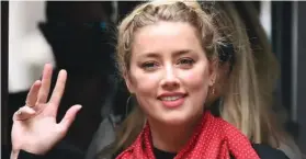  ??  ?? US actress Amber Heard arrives on the seventh day of the libel trial by her former husband US actor Johnny Depp against News Group Newspapers (NGN), at the High Court in London