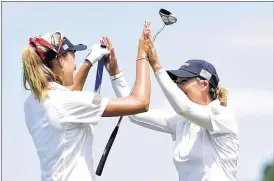  ?? STACY REVERE / GETTY IMAGES ?? Lexi Thompson (left) and Cristie Kerr of the United States celebrate on the 15th green after completing a 4-and-3 victory over a Thailand pair in the UL Internatio­nal Crown at Gurnee, Ill. But the Americans are last in their four-nation group and have...