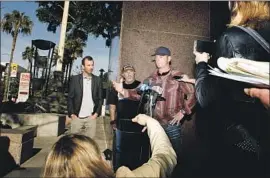  ?? Patrick T. Fallon For The Times ?? JASON FREEMAN, Charles Manson’s grandson, talks to reporters Friday outside an L.A. court. He and two others say they are the rightful heir to the estate.