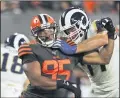  ?? DAVID RICHARD — THE ASSOCIATED PRESS ?? Myles Garrett tries to get past Rams offensive tackle Andrew Whitworth during a 2019game at FirstEnerg­y Stadium.