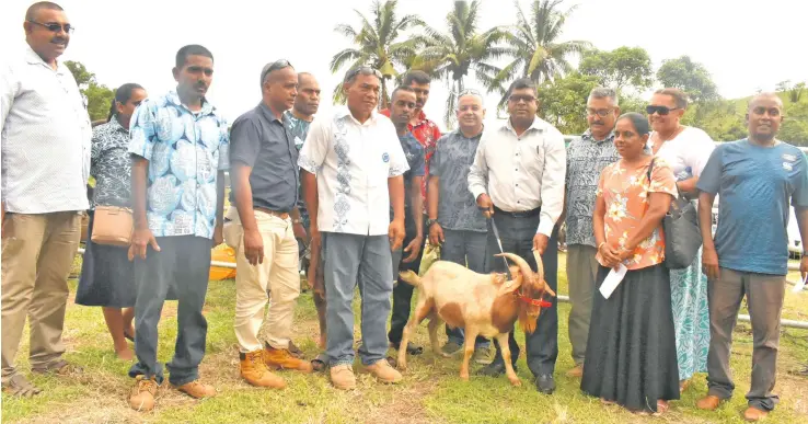  ?? Photo: DEPTFO News. ?? Minister for Agricultur­e, Waterways and Environmen­t Mahendra Reddy (fifth from right) with Sigatoka goat farmers.