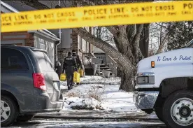  ?? AARON VINCENT ELKAIM / NEW YORK TIMES ?? Police tape surrounds the Toronto property where police said they found the dismembere­d remains of six people in planters. Landscaper Bruce McArthur was sentenced Friday to life in prison in eight murders.
