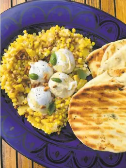  ?? Jessica Battilana ?? Fresh corn in a buttery vinaigrett­e makes a summery meal with grilled flatbread and creamy burrata whether on a picnic or diningroom table.